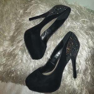 Black bedazzled platform pumps